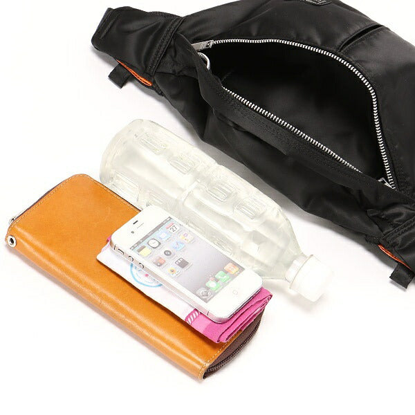 Black PORTER JAPAN waist bag with adjustable strap and multiple compartments, made of durable fabric.
