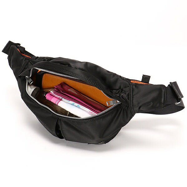 Black Porter Yoshida Japan waist bag with adjustable strap and multiple compartments, stylish and functional for everyday use.