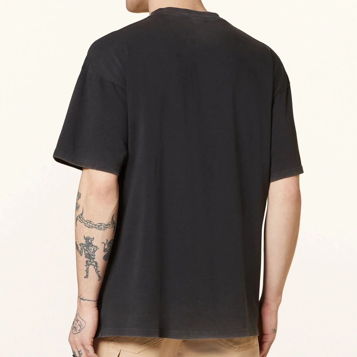 Black Represent Thoroughbred Tee showing the front view with logo and branding details on a plain background.