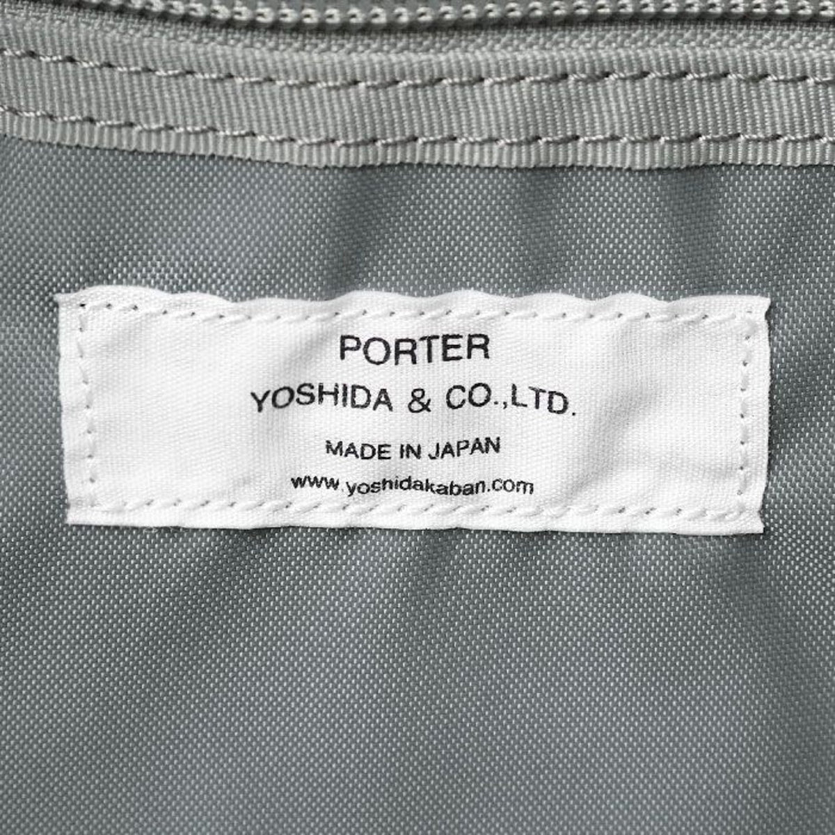 Porter Yoshida Japan Switch waist bag in black with adjustable strap and multiple compartments, made by PORTER JAPAN.