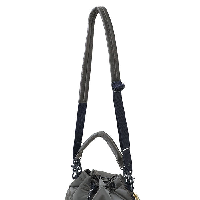 Black Porter Yoshida Japan Tanker 2-Way Tool Bag with multiple pockets and sturdy handles, designed for versatile tool storage.
