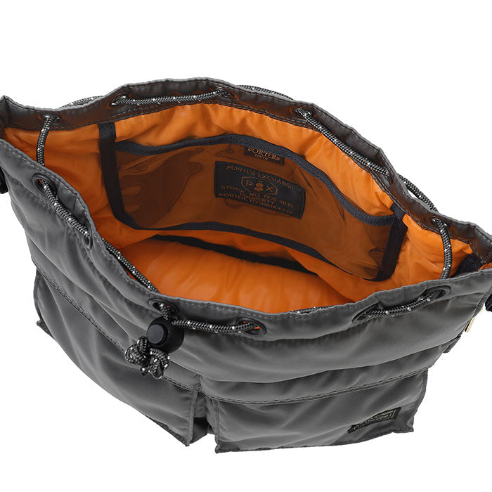 Porter Yoshida Japan Tanker 2-Way Tool Bag in black, durable bag with multiple compartments and sturdy handles for versatile use.