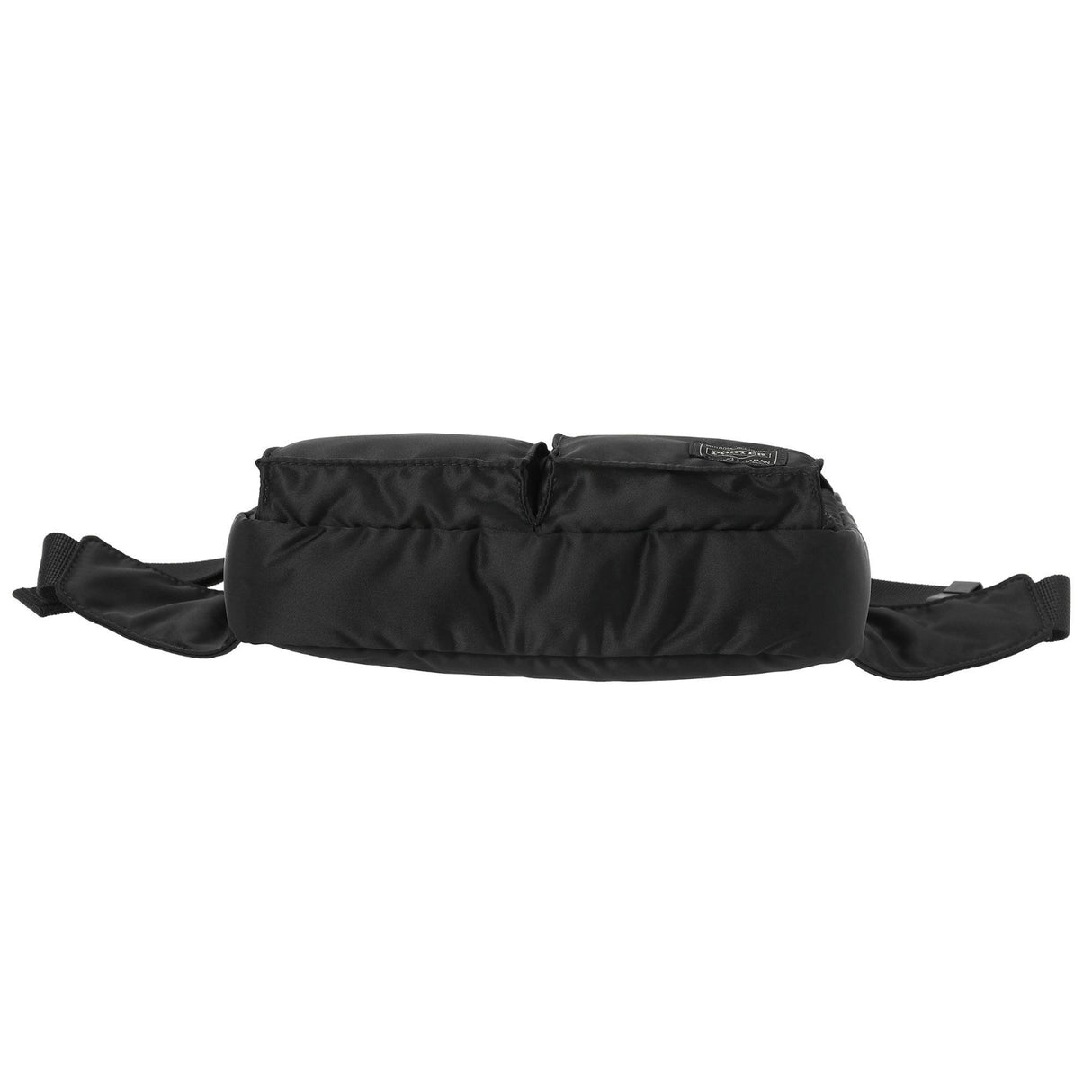 Porter Yoshida Japan Tanker Waist Bag in black, compact design with adjustable strap and multiple compartments, casual accessory.