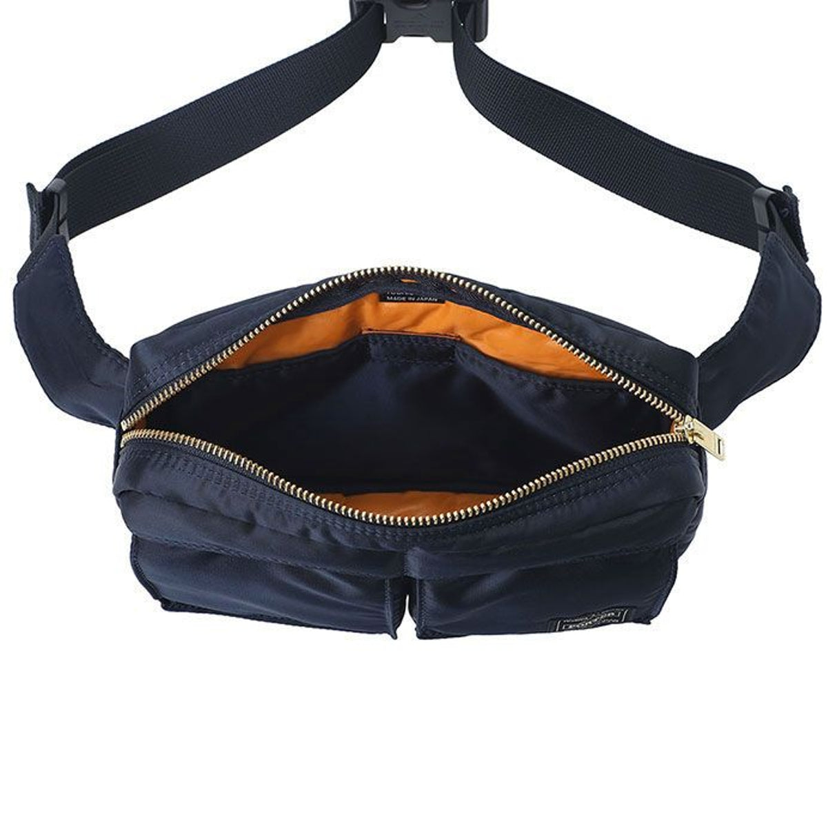 Porter Yoshida Japan Tanker waist bag in iron blue, made of durable fabric with adjustable strap and multiple compartments.