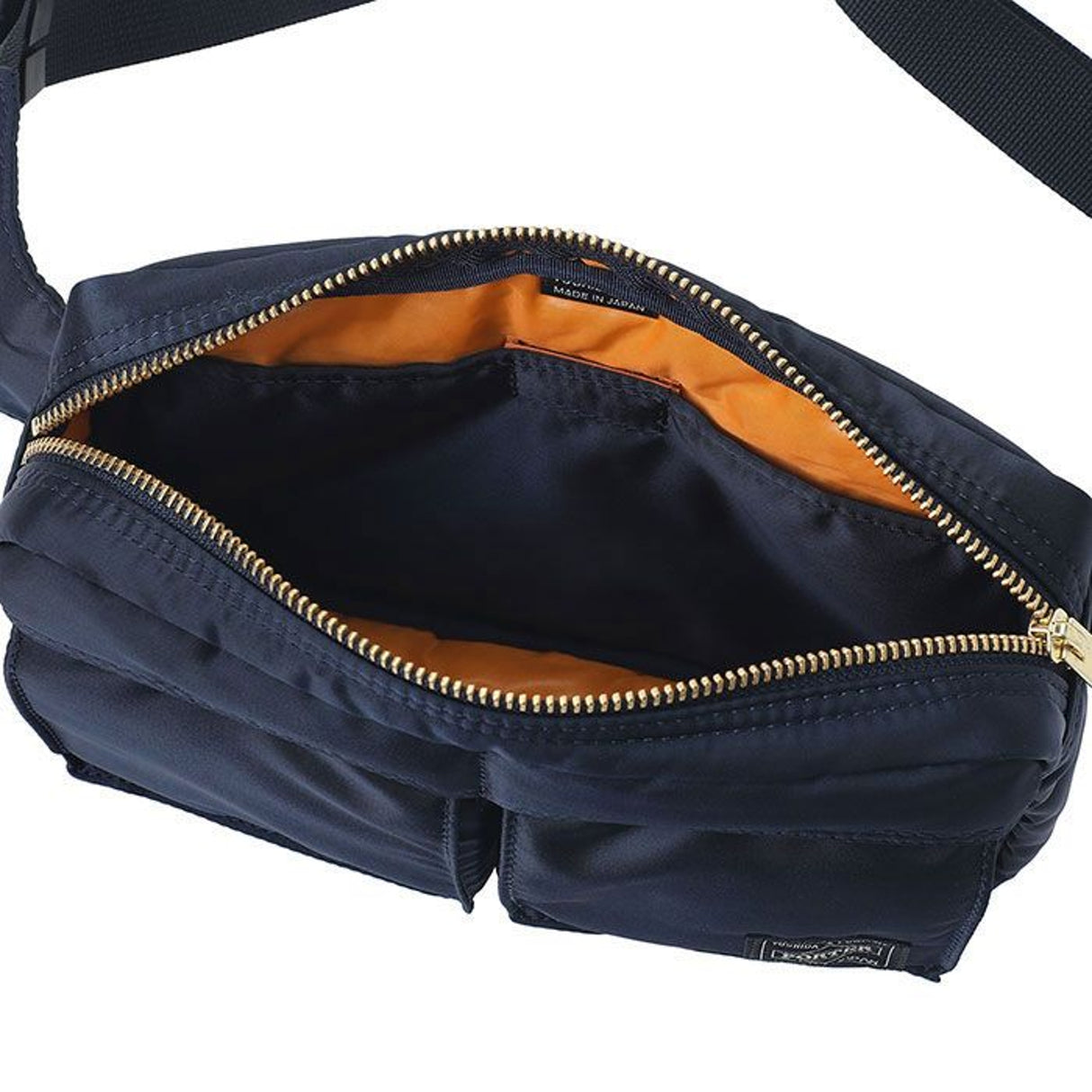 Porter Yoshida Japan Tanker waist bag in iron blue with multiple compartments, made by PORTER JAPAN, shown with adjustable strap.