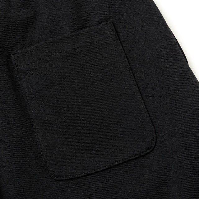 Black Mastermind Japan X New Era Script Logo shorts, casual apparel with branded logo detailing and comfortable fit.