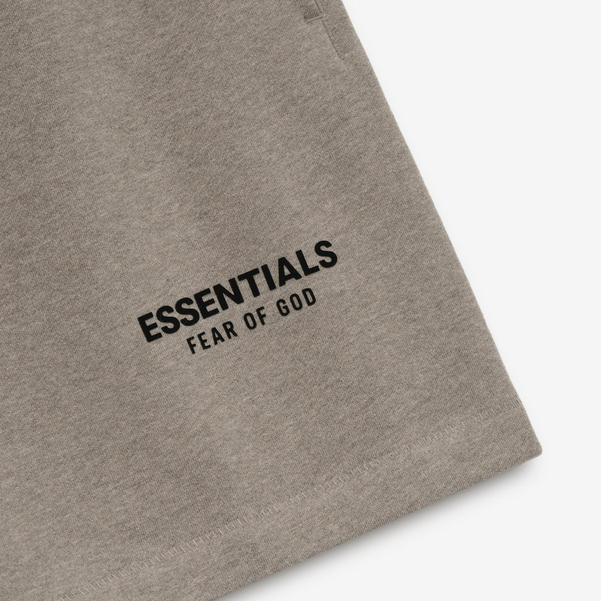 Fear Of God Essentials classic logo sweat shorts in Homestead Heather, featuring a relaxed fit and fleece material for casual wear.