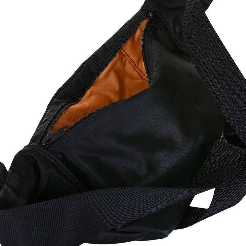 Black Porter Yoshida Japan waist bag with adjustable strap and multiple compartments, made by PORTER JAPAN.