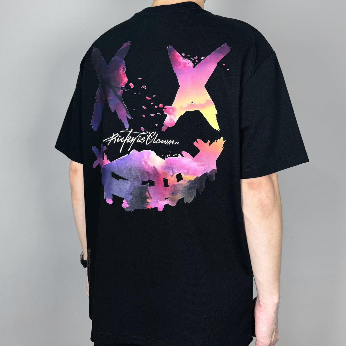 Black Rickyisclown Sakura Sunset Tee featuring vibrant sunset and cherry blossom design, casual apparel by RICKYISCLOWN.