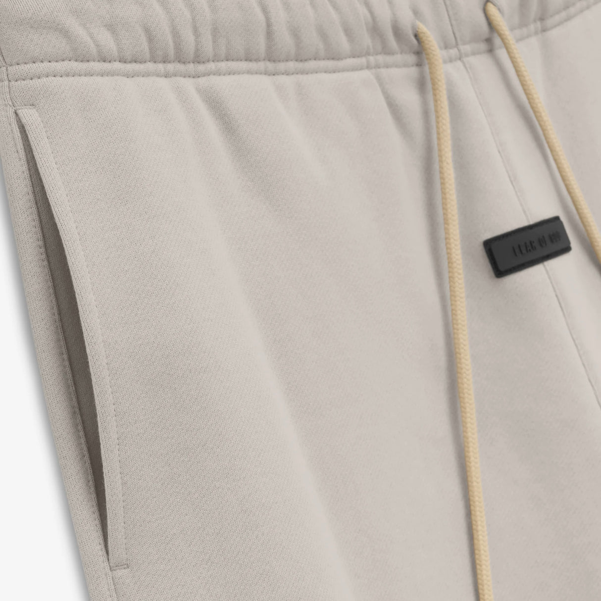Fear of God Essentials Applique Logo Shorts Silver Cloud FEAR OF GOD FEAR OF GOD - originalfook singapore