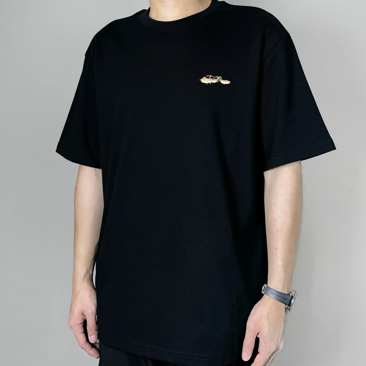 Black Rickyisclown Mountain Smiley T-shirt featuring a graphic design, made by RICKYISCLOWN.