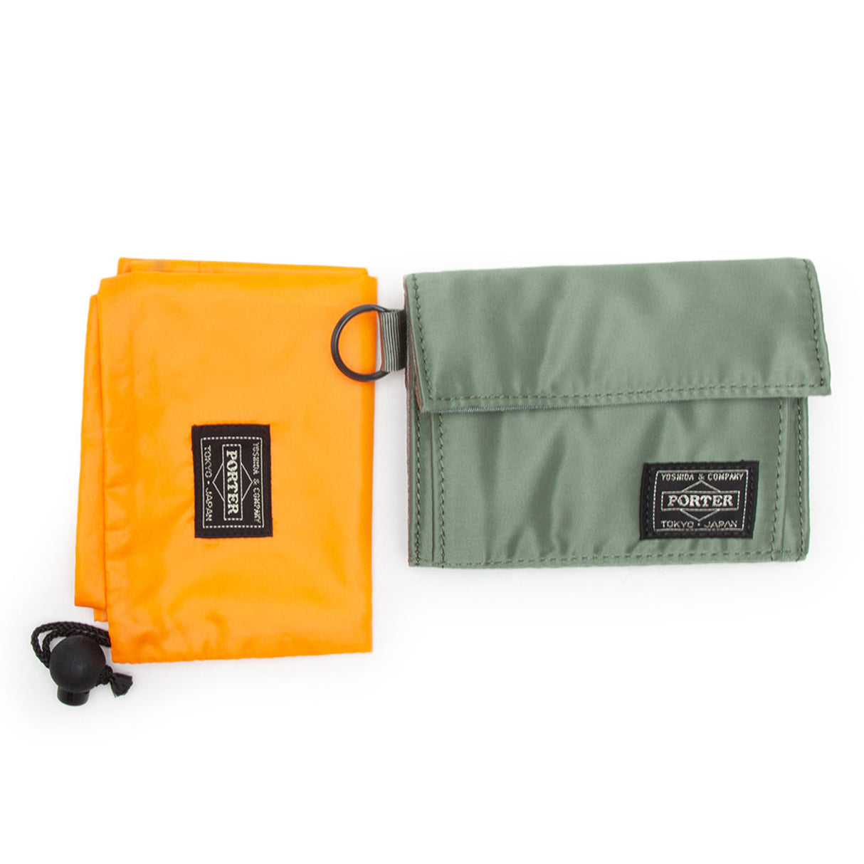 Porter Yoshida Japan Tanker Two-Fold Wallet in sage green with multiple card slots and fold-over design.