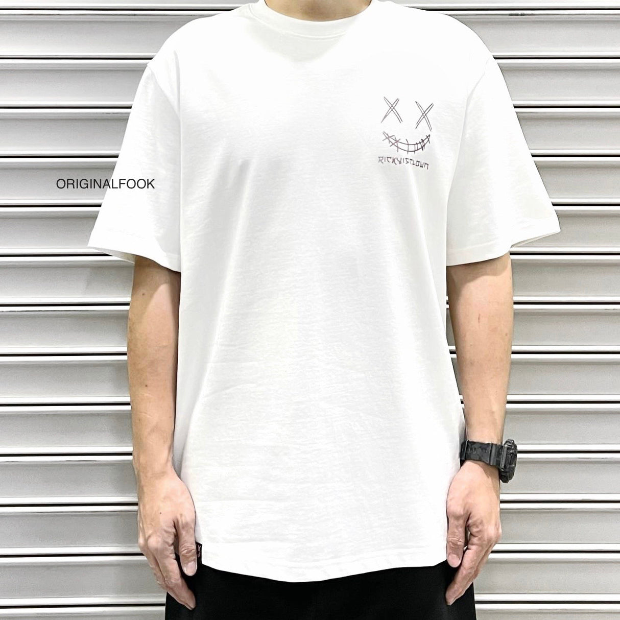 Rickyisclown Japan Lucky Daruma laser reflective white T-shirt by RICKYISCLOWN, featuring bold Daruma design on front.