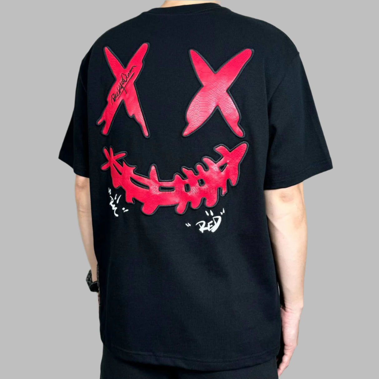 Black Rickyisclown Snake Tee with embossed chest design, casual men's apparel by Rickyisclown.