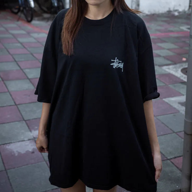 Stussy Built In America black T-shirt for men, casual apparel featuring the Stussy logo and patriotic design.