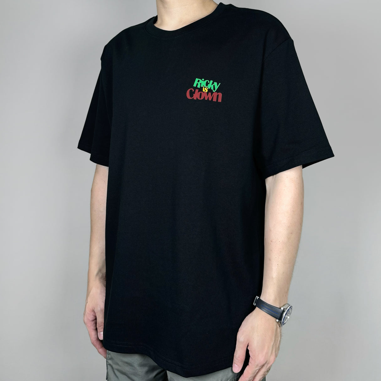 Black Rickyisclown Joker Laser Reflective Smiley Tee shirt with reflective smiley graphic, casual apparel from RICKYISCLOWN.