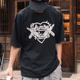 Human Made X KAWS Logo Tee Black HUMAN MADE HUMAN MADE - originalfook singapore