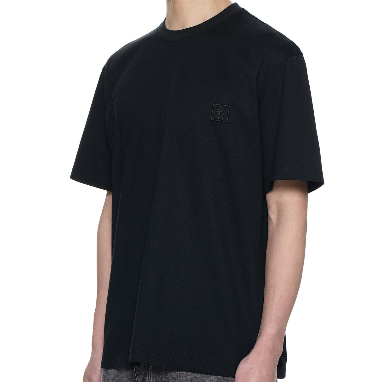 Black Wooyoungmi Signature Logo Tee shirt with logo print, casual apparel by WOOYOUNGMI, shown laid flat on a neutral background.