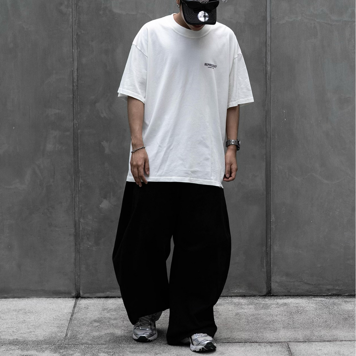 Represent Owners Club Logo Tee in flat white featuring a prominent club logo on the front.