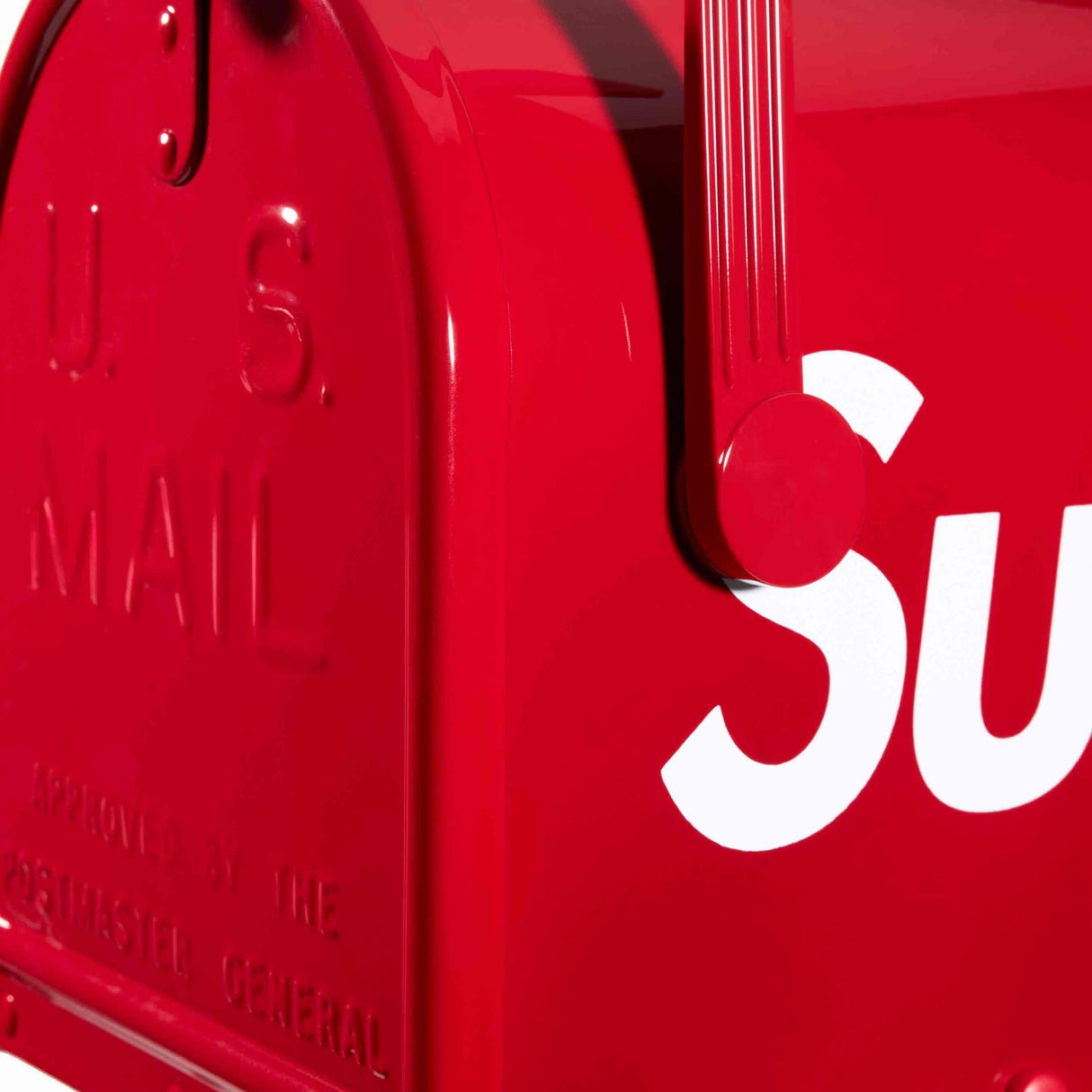 Supreme Gaines Mailbox apparel in red, featuring a bold mailbox graphic design on the front, casual streetwear style.