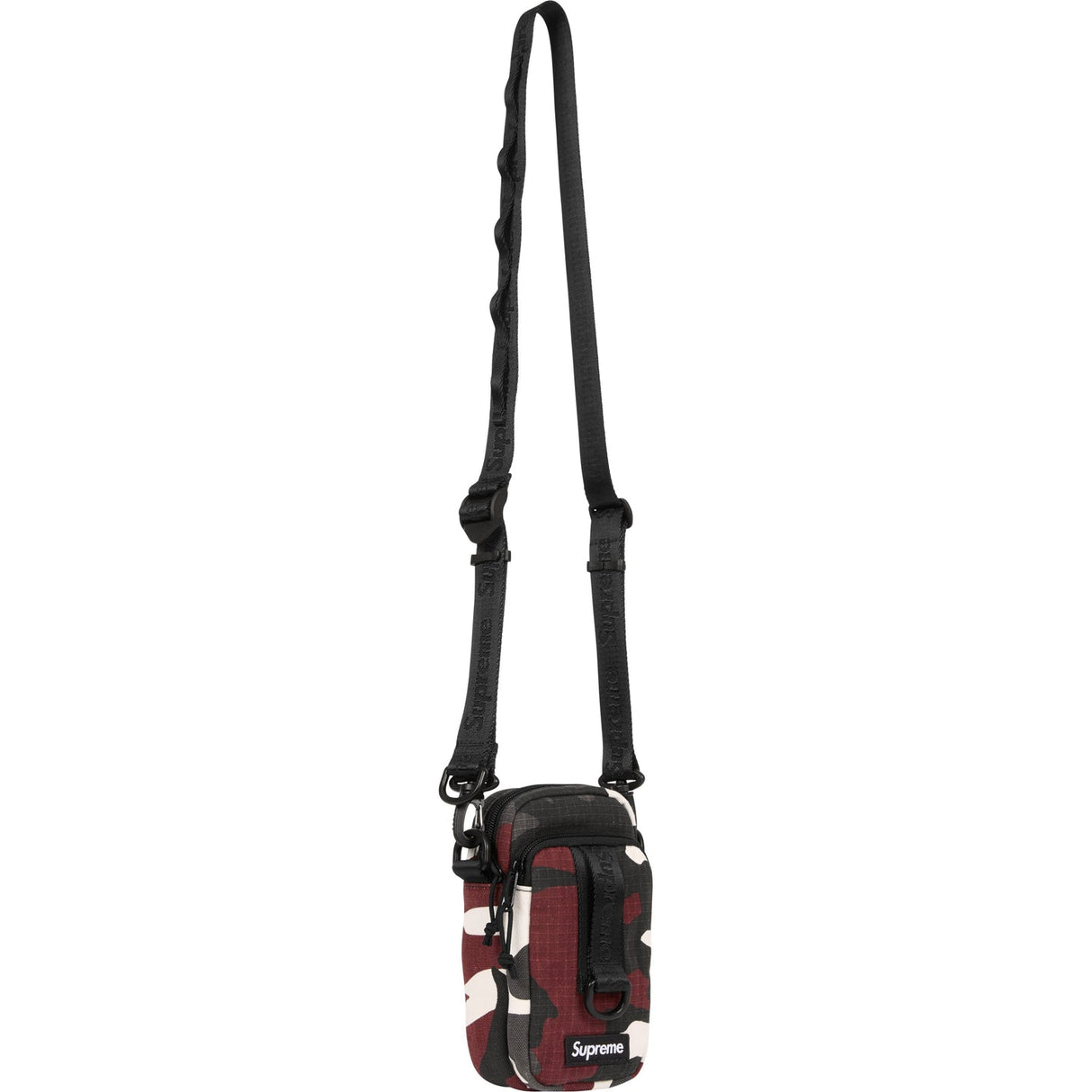 Supreme red camo box logo sling bag with adjustable strap and side zip pocket, designed for casual streetwear style.