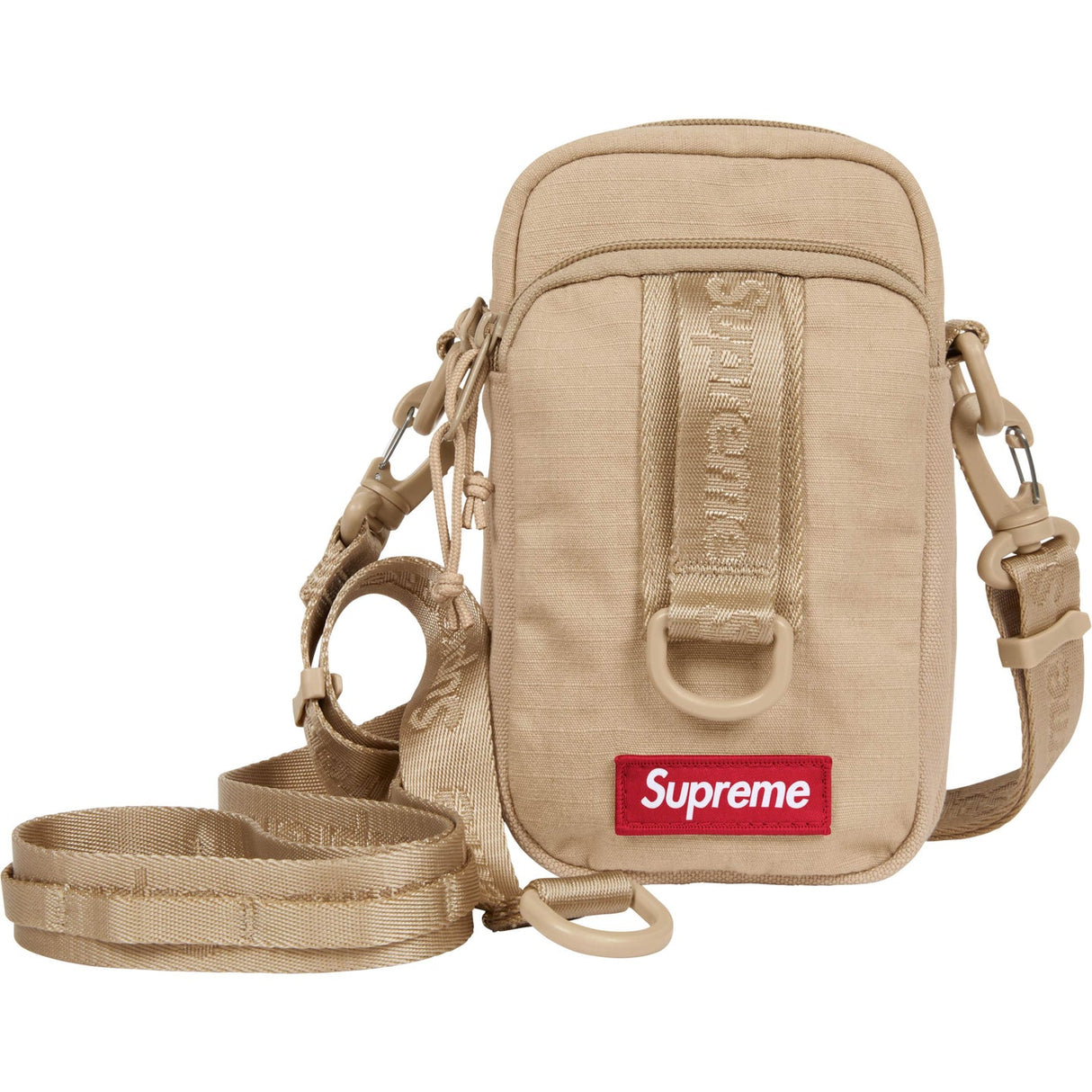 Supreme tan box logo sling bag showing side view with adjustable strap and minimalist design.