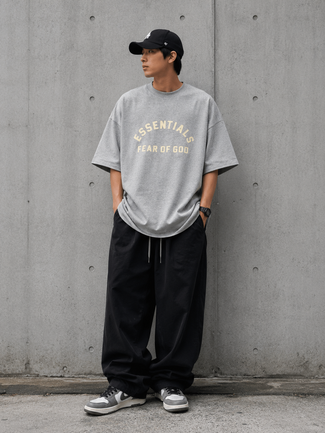 Fear of God Essentials heavyweight light heather T-shirt, casual apparel with a relaxed fit and soft fabric.