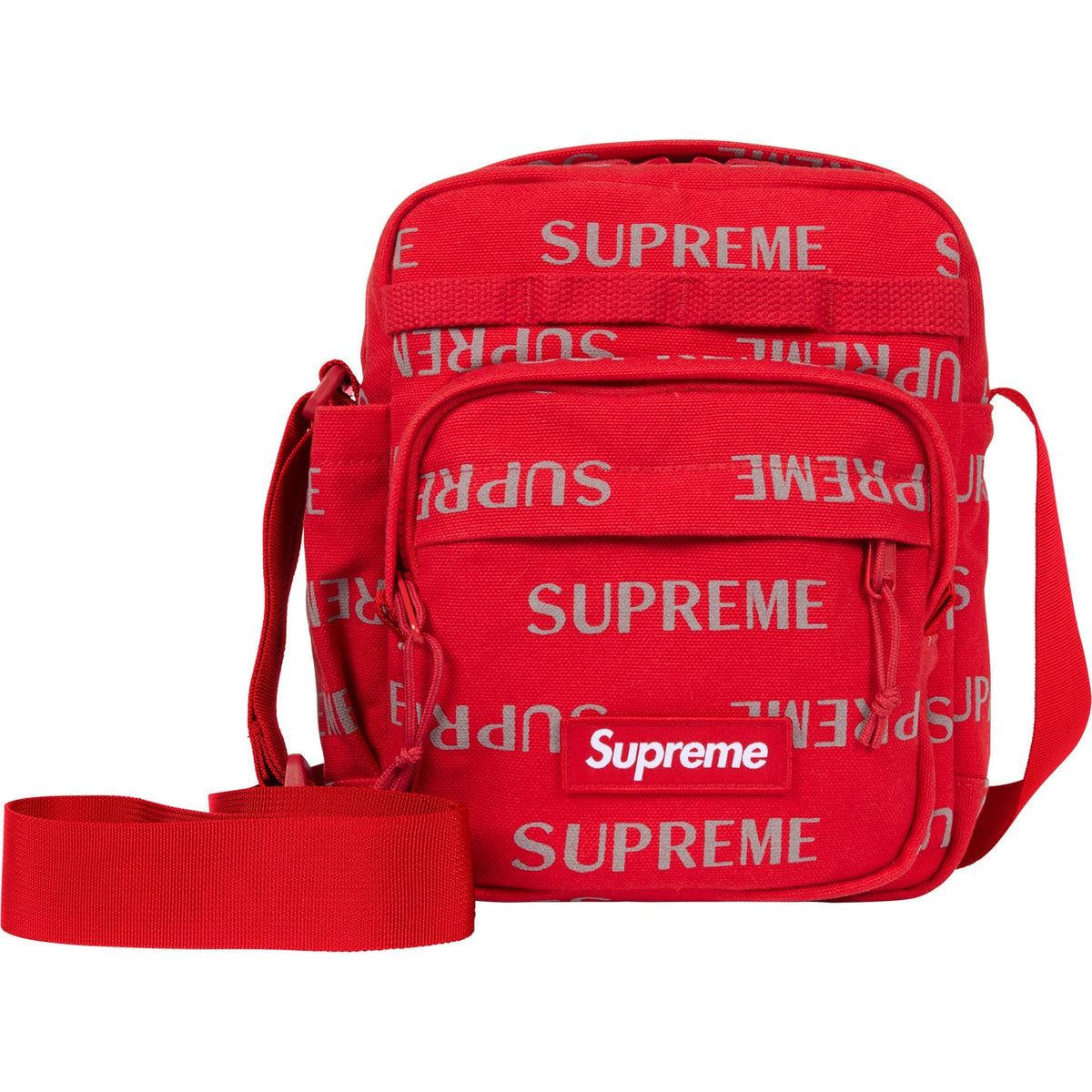 Supreme reflective monogram logo shoulder bag in red with silver logo detail, stylish and compact for everyday use.