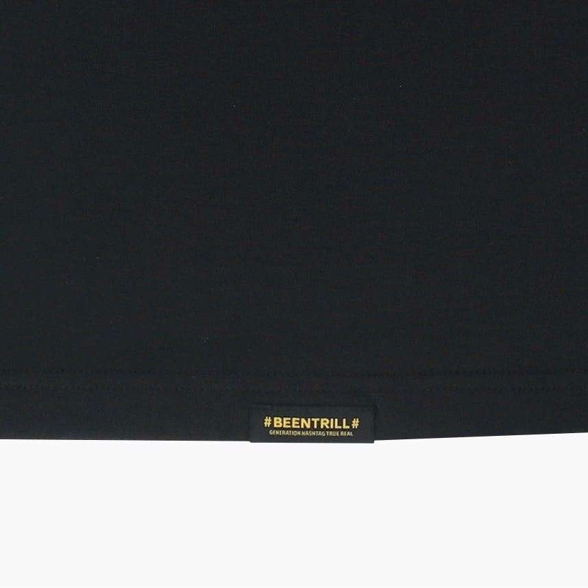 Black BEEN TRILL Been Trill Inverted Logo Tee shirt with front graphic, casual streetwear style, on a plain background.