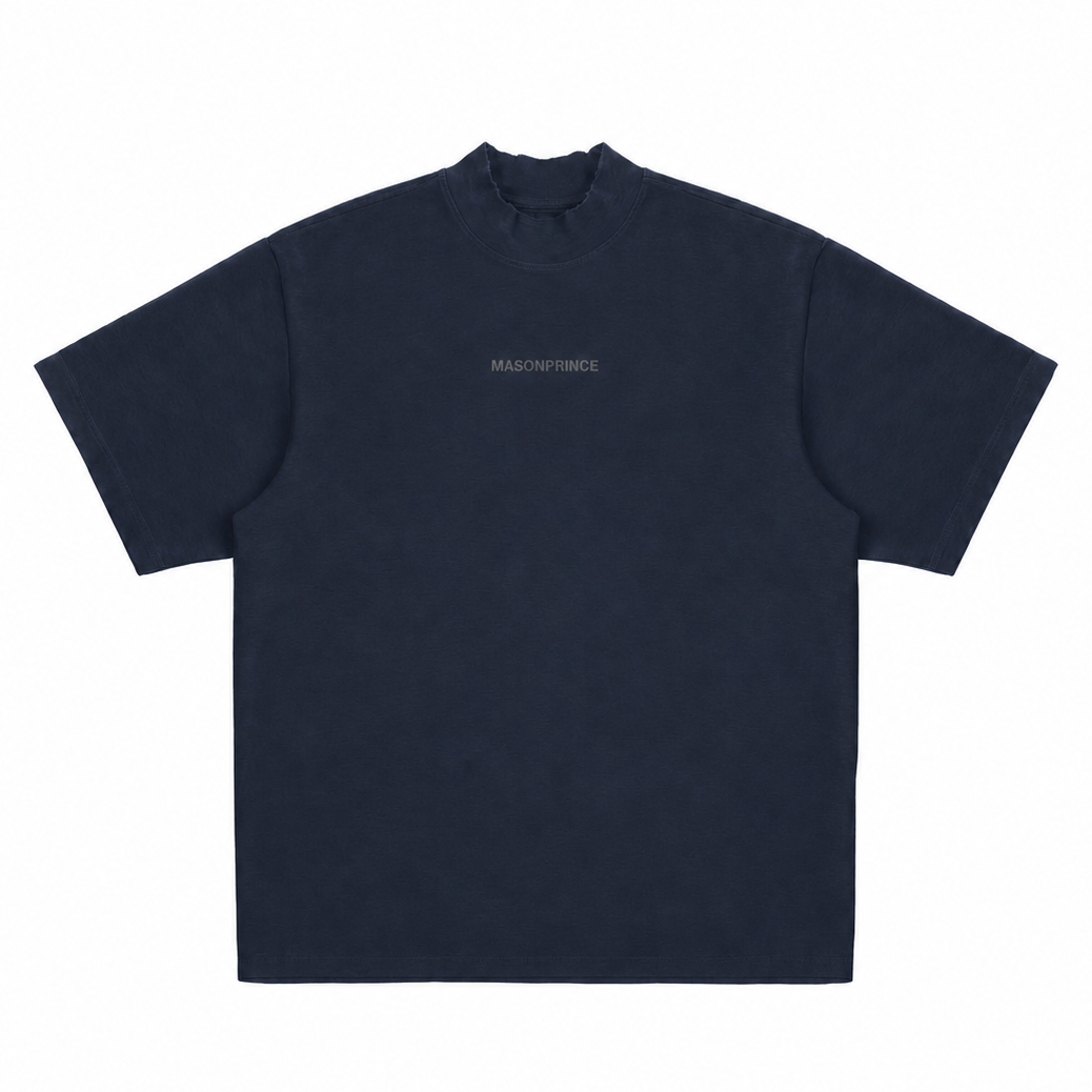 Navy MasonPrince Reflective Oversized Mock Neck Tee displayed on a hanger, highlighting its relaxed fit and reflective details.