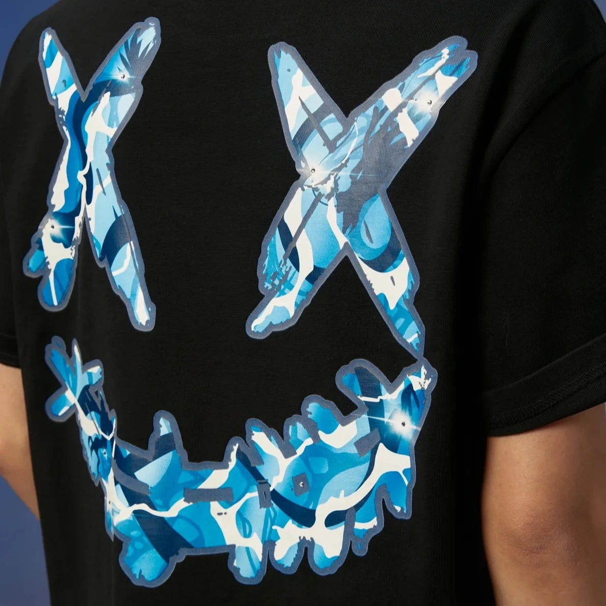 Black Rickyisclown Dragon Tears T-shirt featuring a graphic design, casual fit, and comfortable cotton fabric.