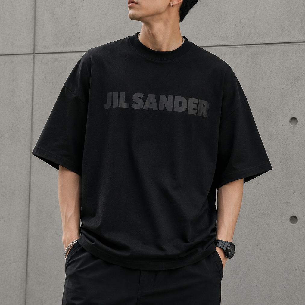 Black Jil Sander Signature Logo Tee shirt with logo print on front, casual fit, made from soft fabric, designed by Jil Sander.