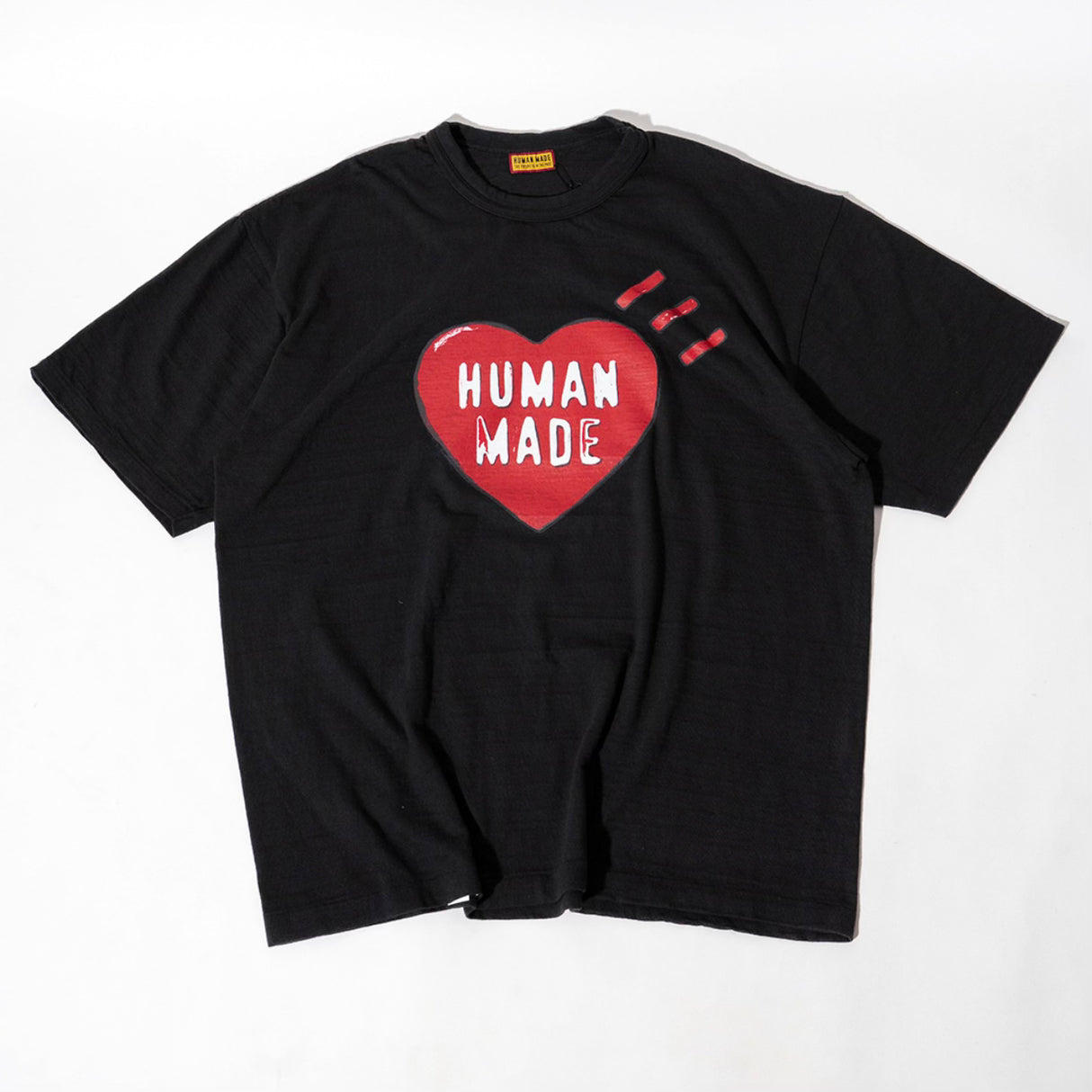 Human Made Red Heart Tee in black, casual apparel with a bold red heart graphic on the front.