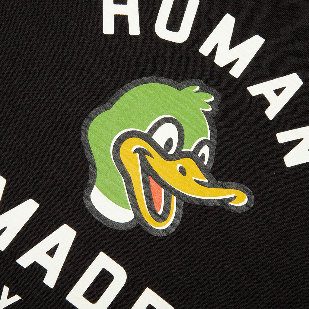 Black Human Made Duck Tee featuring a graphic of a duck on the front, casual apparel for streetwear style.