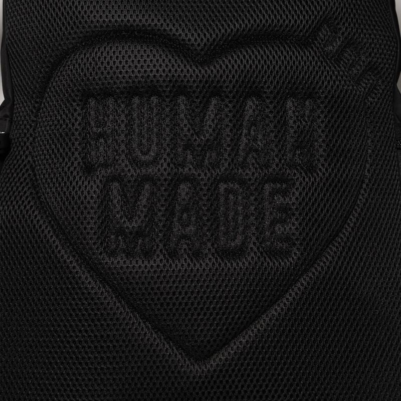 Black Human Made Military Backpack with multiple compartments and adjustable straps, designed for durable everyday use.