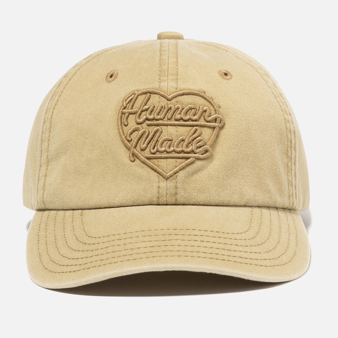 Beige Human Made Heart Logo 6-panel cap, casual headwear with embroidered logo, adjustable strap, and classic six-panel design.