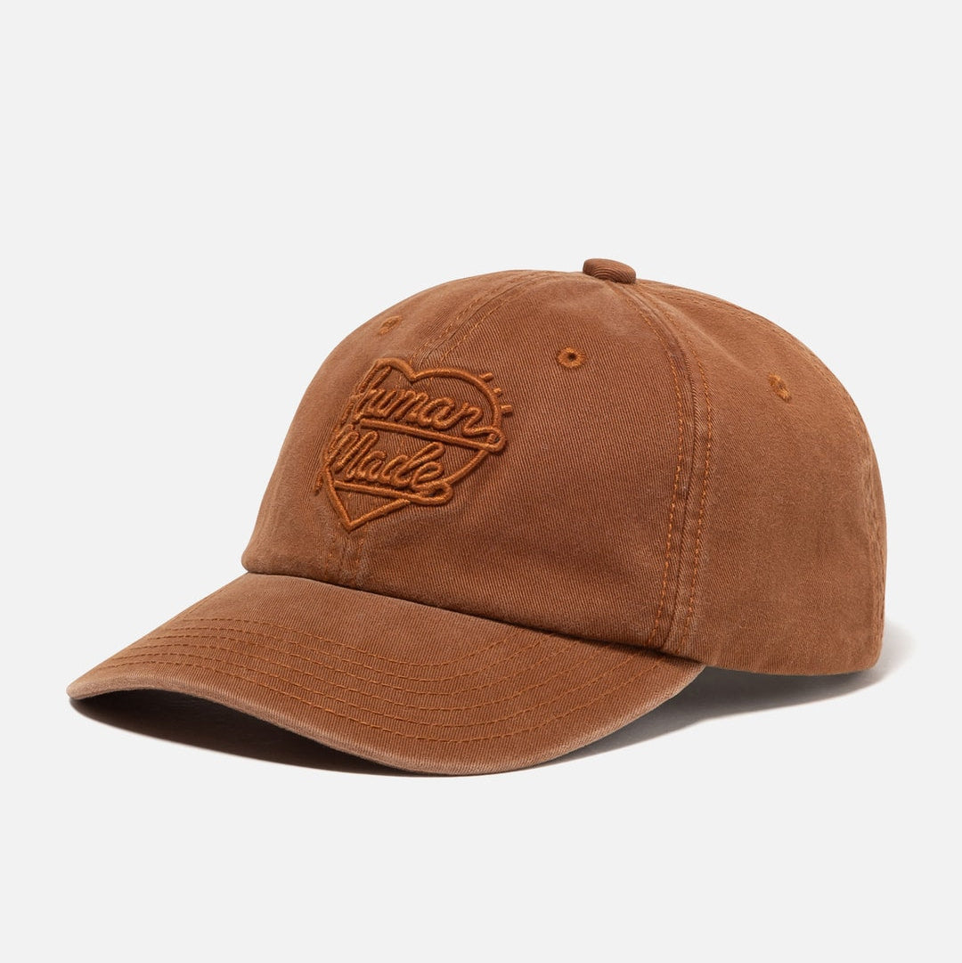 Human Made brown 6-panel cap with embroidered heart logo, stylish headwear for casual wear and street fashion.