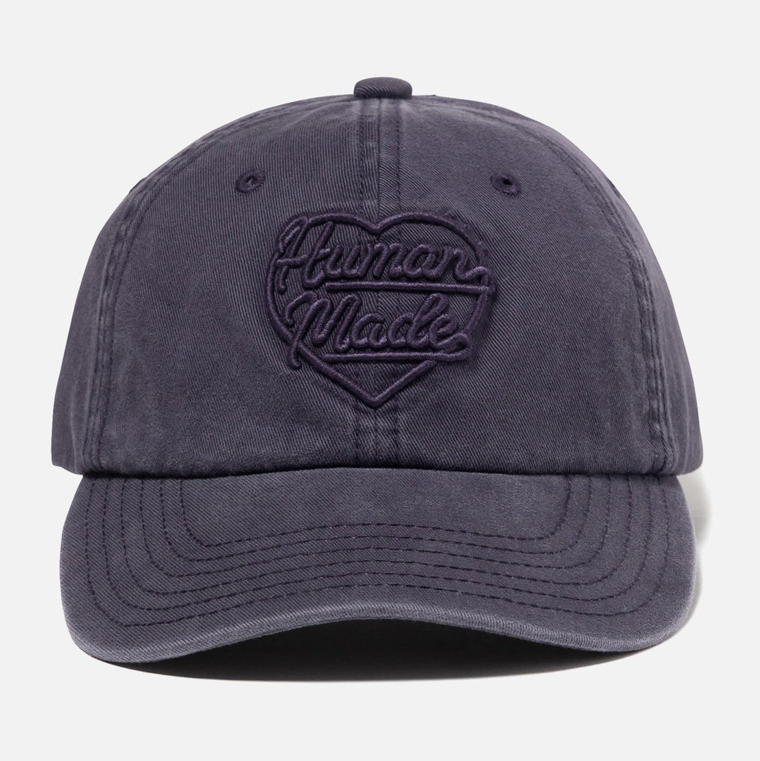 Navy Human Made 6-panel cap with embroidered heart logo, casual headwear for streetwear style.