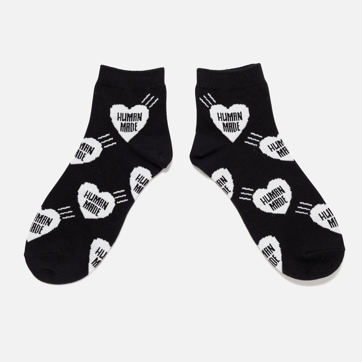 Black Human Made Heart Short Socks featuring a red heart design, made of comfortable, stylish accessories for casual wear.