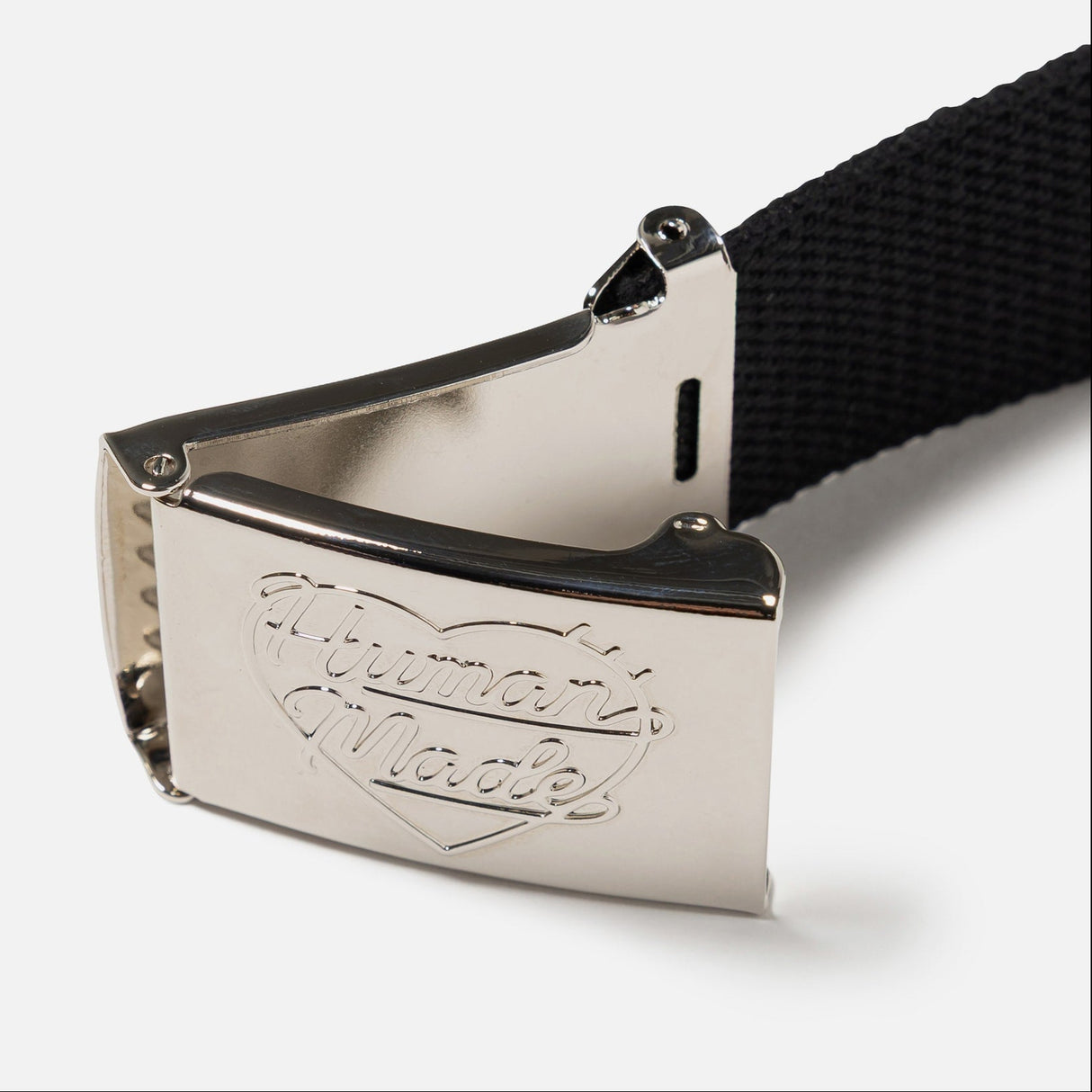 Black Human Made Logo Belt with adjustable strap and branded buckle, stylish accessory for casual and streetwear outfits.