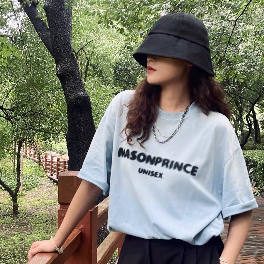 MASONPRINCE MasonPrince Classic Spray Logo Tee in faded blue, casual apparel with a printed logo design.