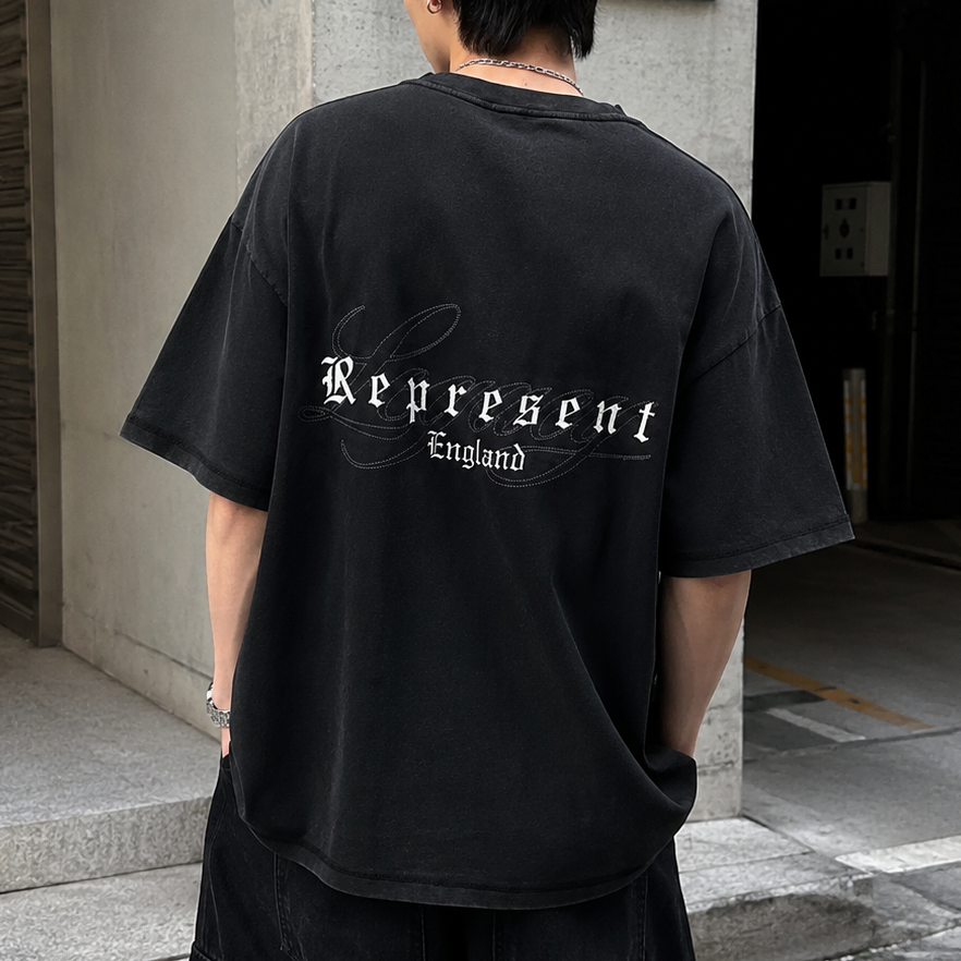 Black Represent Legacy Overprint Tee featuring a bold graphic print and classic crew neck design.