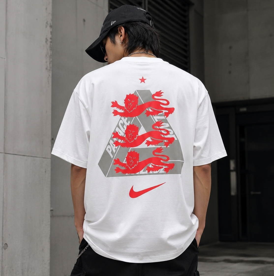 White Nike Palace x England T-shirt with England logo and graphic design, displayed flat on a white background.