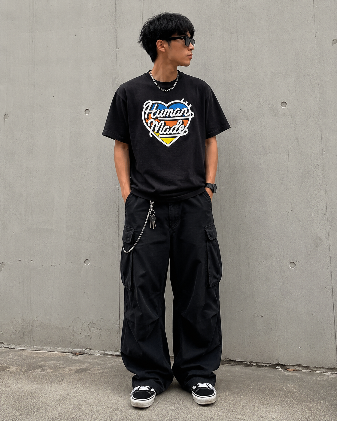 Black Human Made Tri-Color Heart Logo T-shirt showing the colorful heart design on the front.