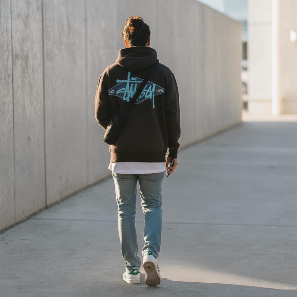 Black Stussy Diamond Logo Zip Hoodie with front zipper, hood, and logo design, made of comfortable sweatshirt material.