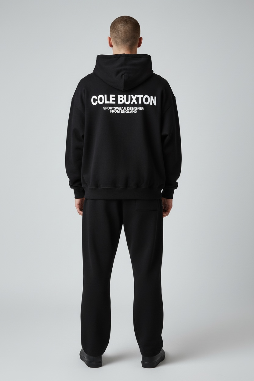 Black Cole Buxton Signature Hoodie with logo detail, featuring a relaxed fit and soft fabric, perfect for casual wear.