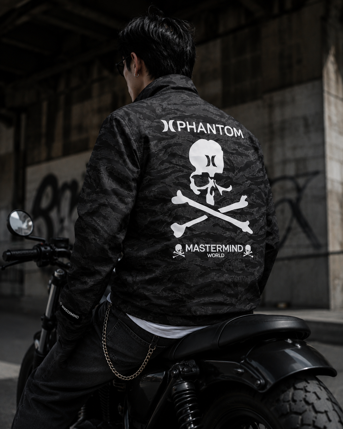 Mastermind Japan Phantom Woven Zip-Up Jacket, Hurley collaboration, shown in a close-up image highlighting the jacket's woven fabric and design.