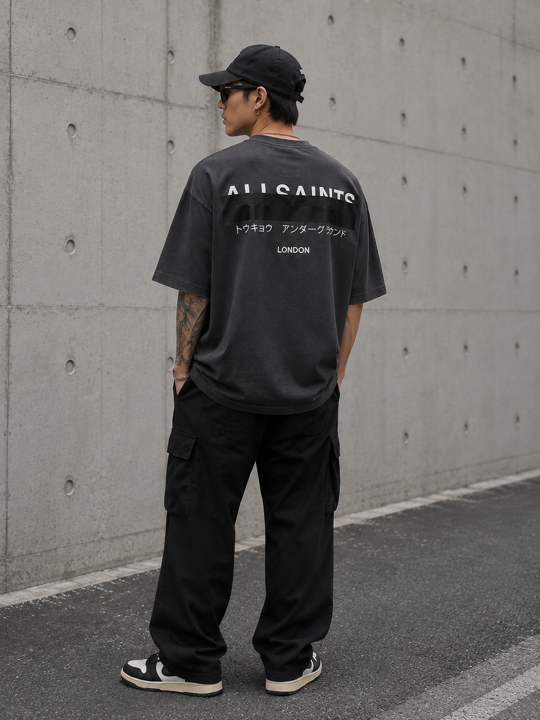 AllSaints Redact Strikeout Logo T-shirt in washed black, casual apparel with bold logo design, made from comfortable fabric.