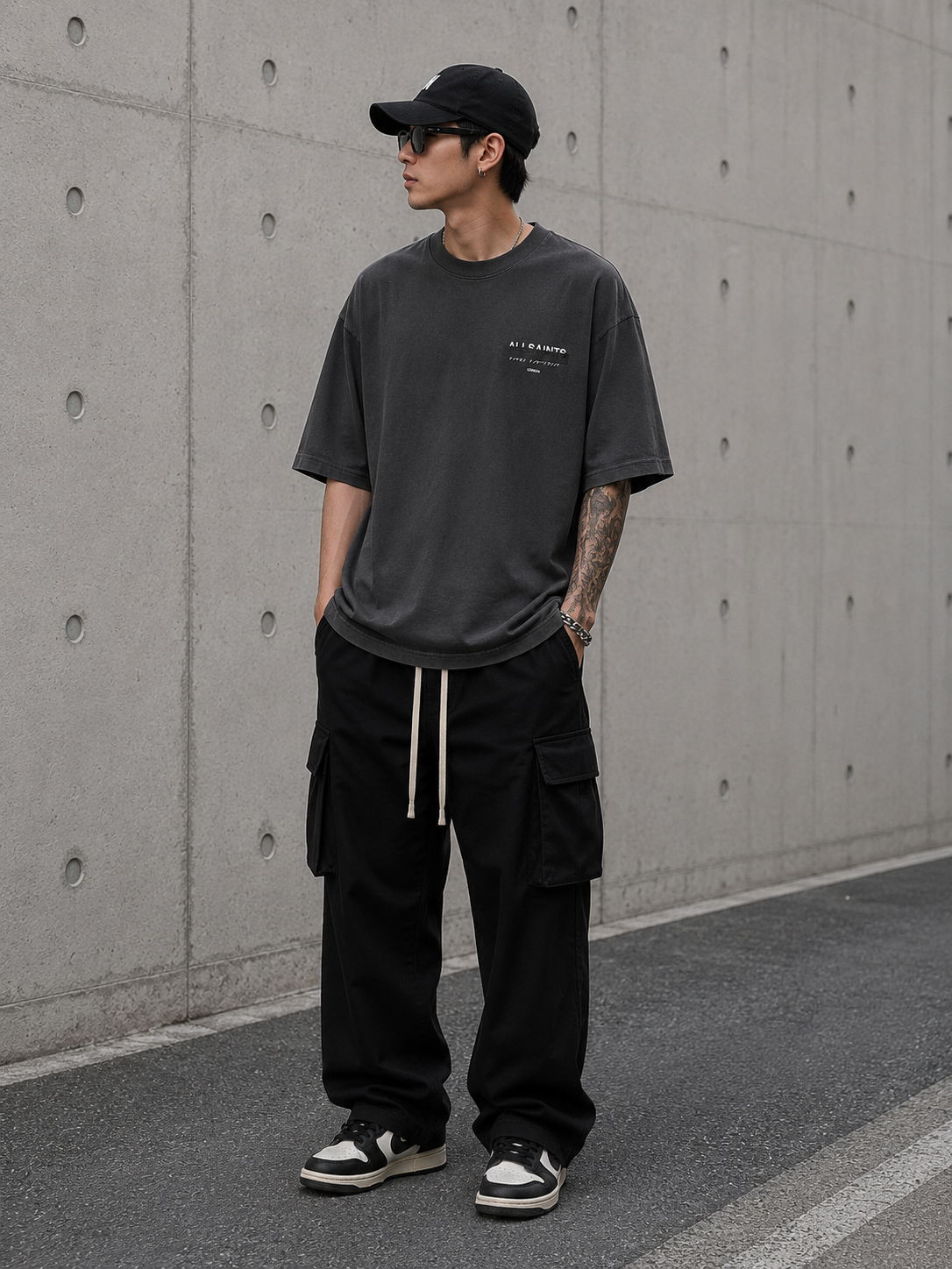 AllSaints Redact Strikeout Logo T-shirt in washed black, casual apparel with bold logo design and comfortable fit.