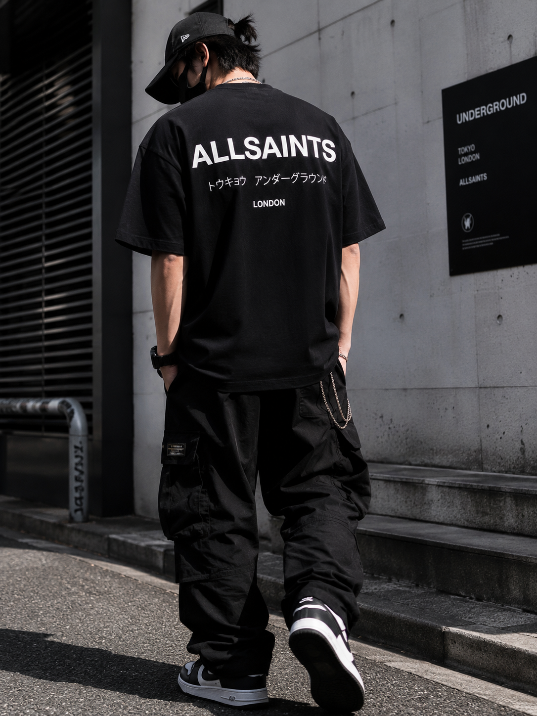AllSaints Underground Logo Tee in black, casual black T-shirt with streetwear-inspired AllSaints branding on the front.
